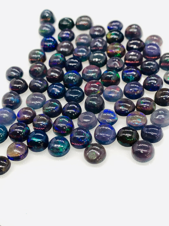 Ethiopian Opal Cabochon • 4 mm Size • Pack of 8 Pcs • Code B32 - AAA Quality • Natural Opal Blue Treated Color • Ethiopian Opal Cabs