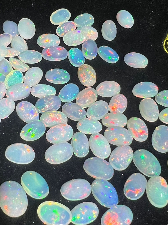 Ethiopian Opal 8X12MM Cabochon Pack of 1 Piece - AAA Transparent Quality  Blue Flash - Ethiopian Opal Oval Cabochon