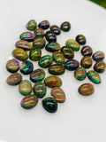 Black Opal Cabochon • 5x7 mm Size • pack of 4 Pcs • Code B6 - AAA Quality • Natural Opal Yellow Treated Color • Ethiopian Opal Cabochon