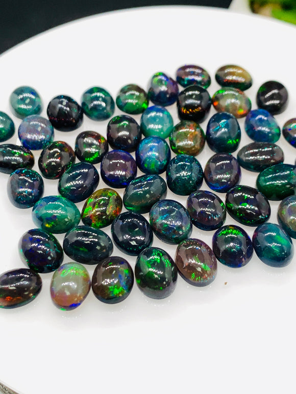 Black Opal Cabochon • 7x9 mm Size • Pack of 2 Pcs • Code B14 - AAAA Quality • Natural Opal Dark Green Treated Color • Ethiopian Opal Cabs