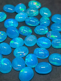 Opal Cabochon 9X11mm Size • pack of 1 Pcs AAA Quality • Natural Opal Blue color Treated Color • Ethiopian Opal Cabochon