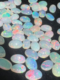 Ethiopian Opal 8X12MM Cabochon Pack of 1 Piece - AAA Transparent Quality  Blue Flash - Ethiopian Opal Oval Cabochon