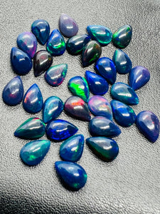 Black Opal 6X9MM Cabochon • Pack of 5 Pcs • AAAA Quality • Natural Opal color Treated Color • Ethiopian Opal pear Cabs