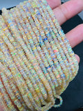 4MM Ethiopian Opal Smooth Roundel Beads 16 Inch Strand, AAA Quality opal beads. code #2, Yellow Natural Ethiopian Opal beads.