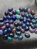 Black Opal Cabochon • 7x9 mm Size • Pack of 2 Pcs • Code B12 - AAAA Quality • Natural Opal  Treated Color • Ethiopian Opal Cabs