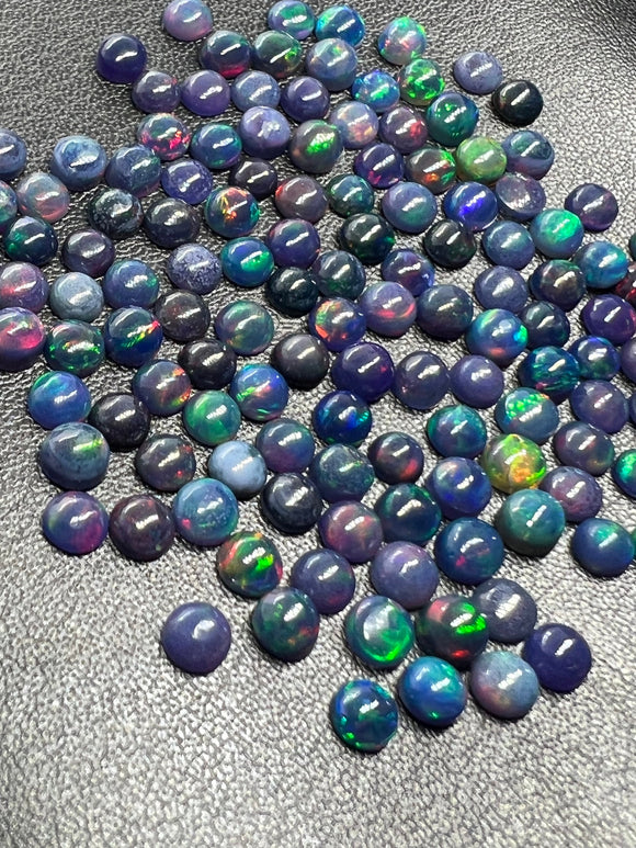 Black Opal Cabochon • 4 mm Size • Pack of 15Pcs • Code B28 - AAAA Quality • Natural Opal Treated Color • Ethiopian Opal Cabs