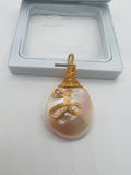 Freshwater Pearl pendant with wire wrapping, Silver wire with Gold plating, good luster on pearl.