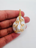 Freshwater Pearl pendant with wire wrapping, Silver wire with Gold plating, good luster on pearl.