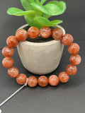 Sunstone Bracelet 12 mm size- Code #V27 -AAA Quality -Weight 43 gm gm Natural Sunstone Round Bracelet - Length 7.5 Inch