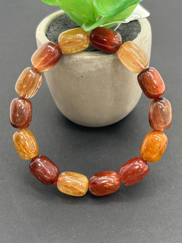 Multi Rutile Bracelet •Size 10X14 mm • Code #D2• AAA Quality •Weight 33.5 gm. Natural Rutilated Quartz Bracelet, barrel shape