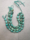 Turquoise nugget shape- 12X16 MM arpprox- genuine Turquoise tumble beads- Length 10", origin Peru.