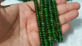 6MM Chrome Diopside Smooth Roundel 6~6.5mm , Very good quality in 15" Length,country of origin Russia
