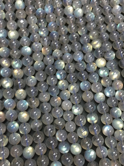 6MM Labradorite half strand Round beads, Top Quality perfect round shape . Yellow and Blue Fire -length 7.5 Inch