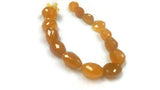 Chalcedony Dark Yellow Faceted Nugget shape, size approx 20x26MM ,length 15" Mango color Faceted tumble shape