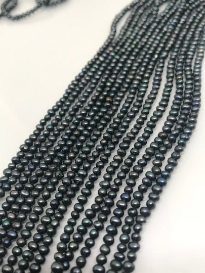 2.5MM Freshwater Black Cultured Pearl .Natural Freshwater pearl , AAA Grade,Irregular Button shape pearl- 40 cm length