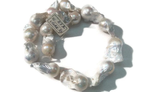 FRESH WATER Pearl Baroque Shape , White pearl Nugget shape . Length 16