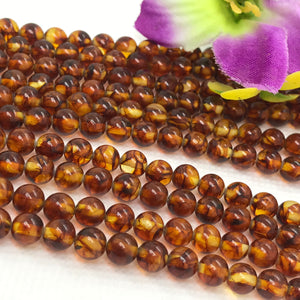 Amber 6MM Round beads , AAA Quality Natural Amber from Ukraine. Length 7.5 Inch . Perfect Round beads , Half Strand