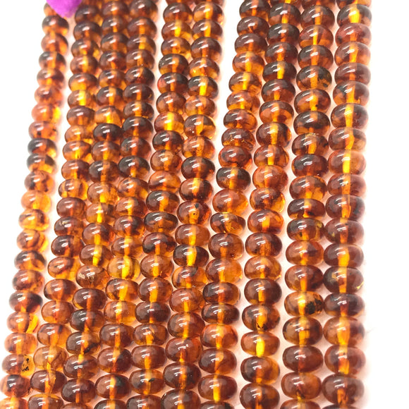 Amber 6MM Roundel beads , AAA Quality Natural Amber from Ukraine. Length 16 Inch . Perfect Round beads .