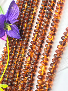 Amber 8MM Roundel beads , AAA Quality Natural Amber from Ukraine. Length 16 Inch . Perfect Round beads .