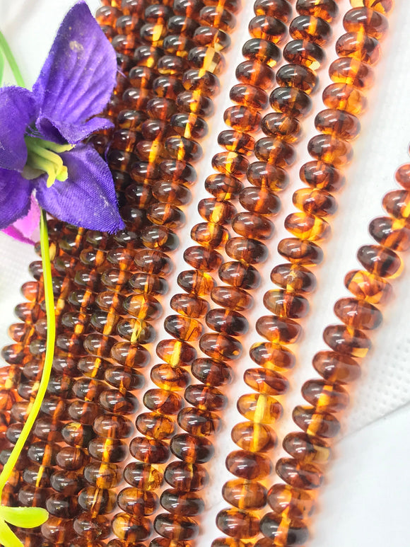 Amber 8MM Roundel beads , AAA Quality Natural Amber from Ukraine. Length 16 Inch . Perfect Round beads .