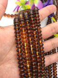 Amber 8MM Roundel beads , AAA Quality Natural Amber from Ukraine. Length 16 Inch . Perfect Round beads .