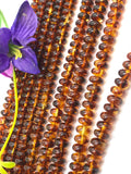 Amber 6MM Roundel beads , AAA Quality Natural Amber from Ukraine. Length 16 Inch . Perfect Round beads .