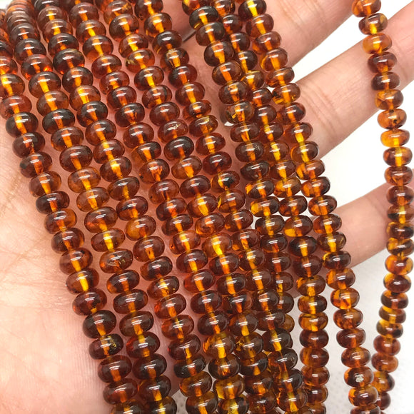 Amber 6MM Roundel beads , AAA Quality Natural Amber from Ukraine. Length 7.5 Inch . Perfect Round beads . HALF STRAND