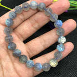 8MM Labradorite Carving Round Bracelet , Top Quality  Perfect shape . Yellow and Blue Fire AAA Grade , Hand made carving .Video available