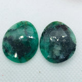 Emerald Faceted Matching Pair shape ,Emerald Faceted Polki shape,Size 26X21 MM , weight 32 ct . code #E2 , Emerald pair , origin Zambia