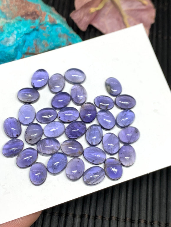 8 Pcs Iolite Oval Cabochon 6x8mm size Code #i4 Medium Violiet Color- AA Quality  Natural Iolite Cabs -Iolite Loose Stones Pack of 8 Piece )