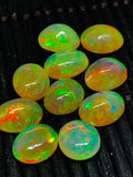 Ethiopian Opal Cabochon 8x10mm size Pack of 1 Piece - Code# A8 AAA Quality Dark Yellow Color With Green Flash