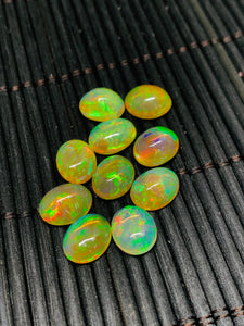 Ethiopian Opal Cabochon 8x10mm size Pack of 1 Piece - Code# A8 AAA Quality Dark Yellow Color With Green Flash
