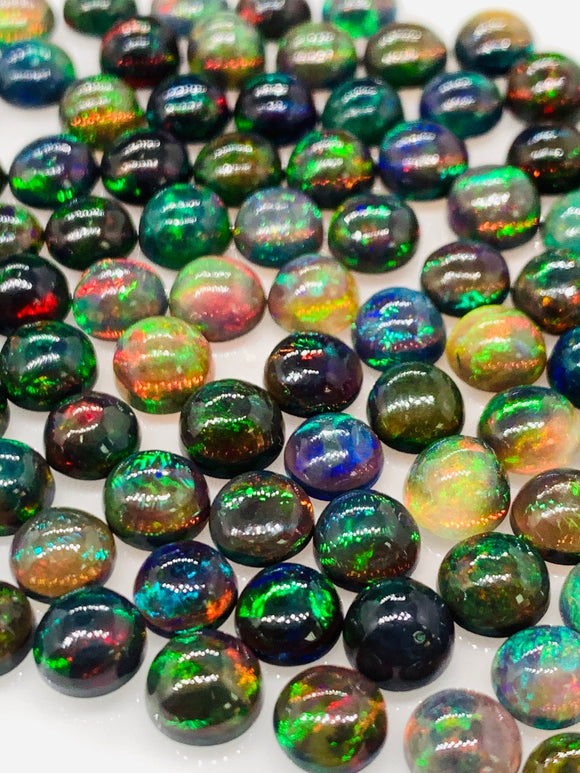 Black Opal Cabochon • 4 mm Size • Pack of 10 Pcs • Code B28 - AAAA Quality • Natural Opal Treated Color • Ethiopian Opal Cabs